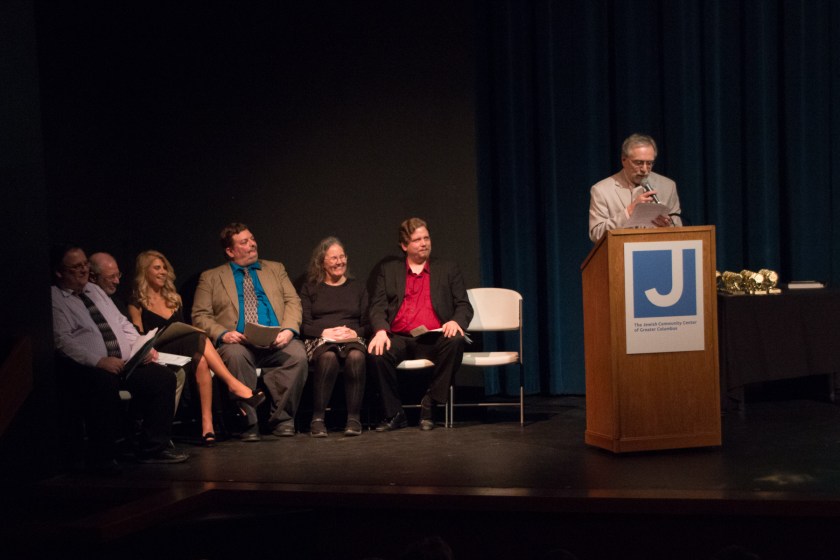 Taking part in the Theatre Roundtable’s 2016 Awards Night are critics (from left) Paul Batterson, Jay Weitz, Christina Mancuso, Michael Grossberg, Margaret Quamme, Richard Sanford and (at the podium) Richard Ades (photos by Jerri Shafer)